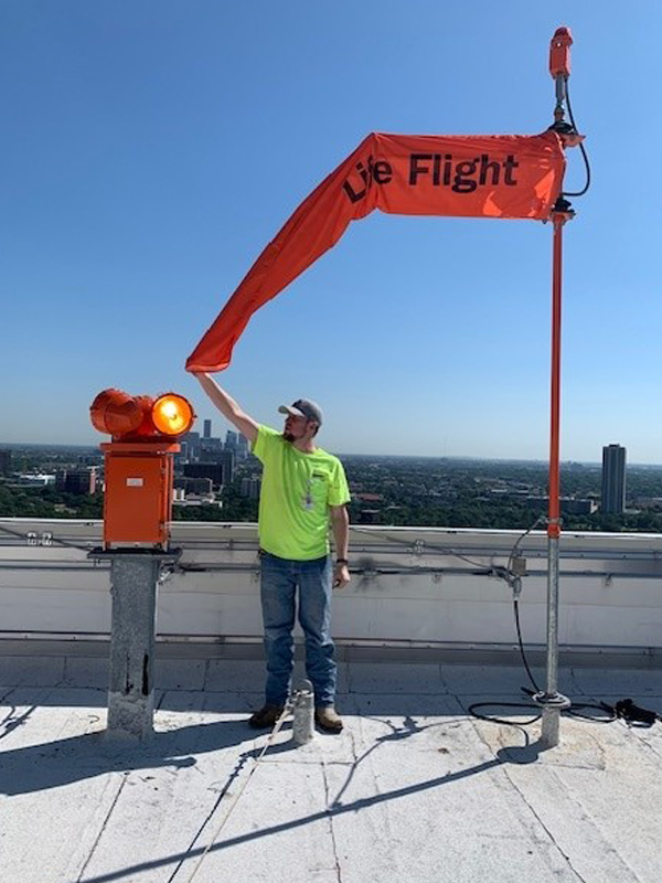 a man holding a sign