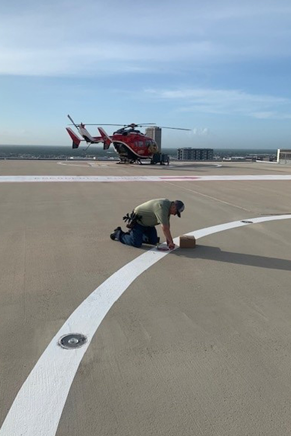 a small airplane sitting on the tarmac of an airport runway